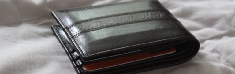 Wallet illustrating the minimum wage in Thailand and its impact on workers.