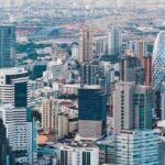 Skyline of Bangkok illustrating Investing Thailand opportunities in real estate, business, and finance.