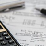 Calculator and financial documents illustrating Thailand investment opportunities