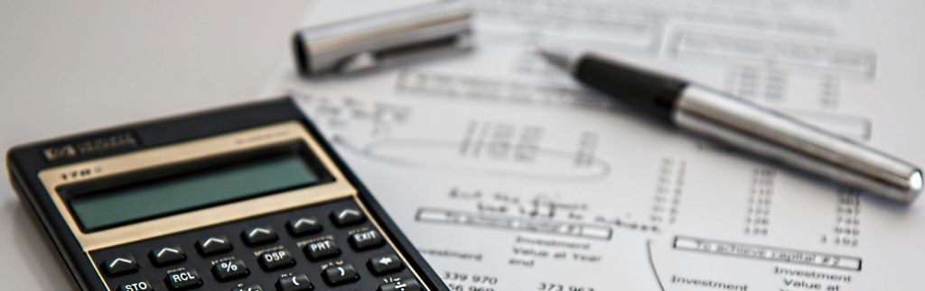 Calculator and financial documents illustrating Thailand investment opportunities