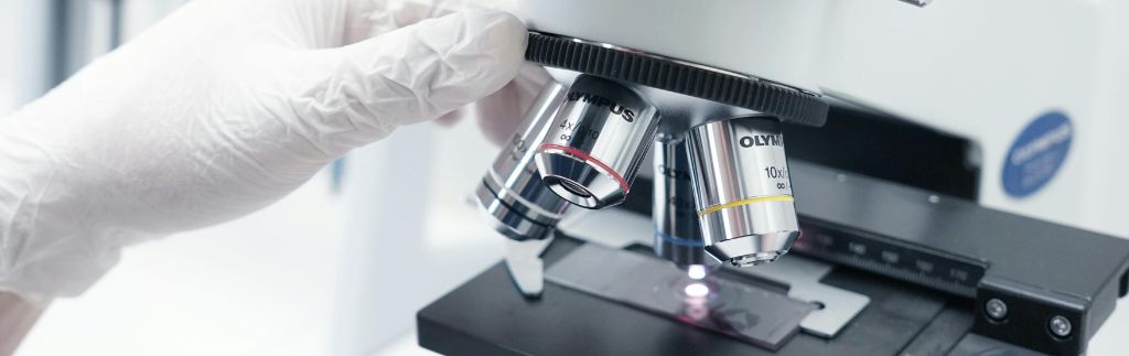 Close-up of microscope in a lab, representing research activity in a biotech company Thailand.