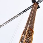 Skyscraper and crane illustrating the impact of the Building Control Act in Thailand