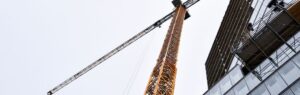 Skyscraper and crane illustrating the impact of the Building Control Act in Thailand