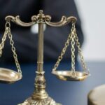 Golden balance scale symbolizing justice under the civil and commercial code Thailand