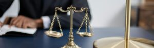 Golden balance scale symbolizing justice under the civil and commercial code Thailand