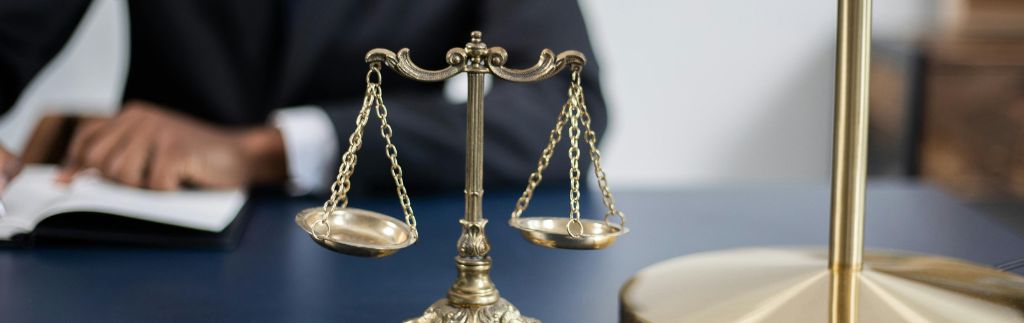 Golden balance scale symbolizing justice under the civil and commercial code Thailand