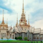 Thai temple at sunset representing cultural heritage for every expat in Thailand