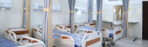 Interior of a modern medical clinic Thailand with patient beds and privacy curtains