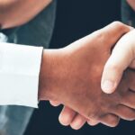 Handshake symbolizing a nominee shareholder in Thailand agreement