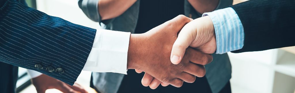 Handshake symbolizing a nominee shareholder in Thailand agreement