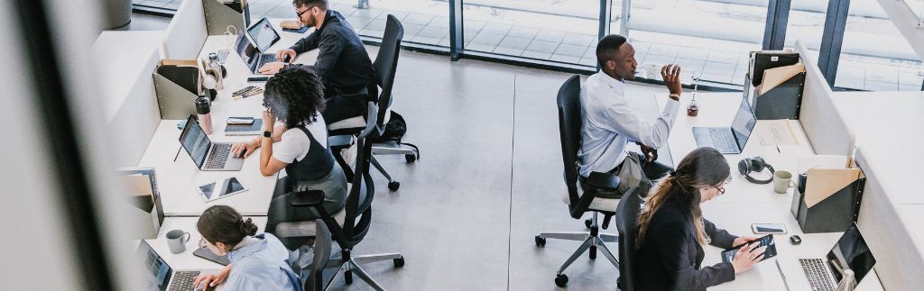 Employees working in a modern office in Thailand, illustrating thailand working hours.