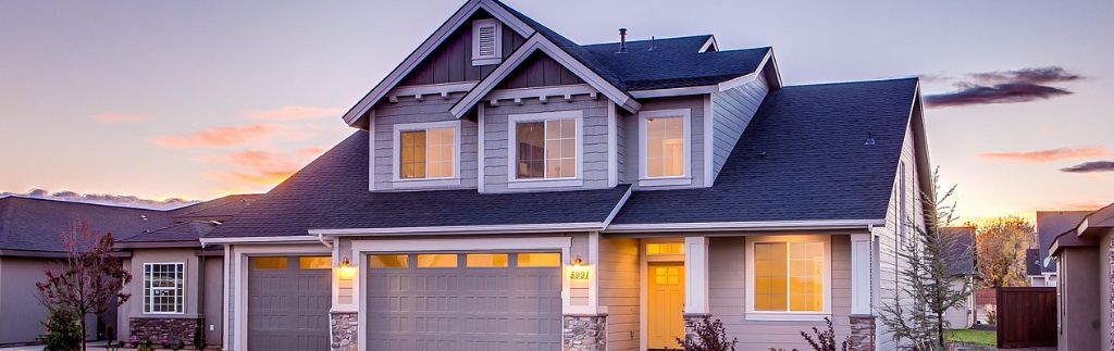 Modern house exterior at sunset, representing buying a house in Bangkok as a foreigner