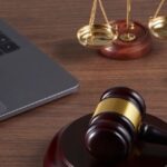 Motorcycle accident Thailand legal consultation with gavel and law office desk