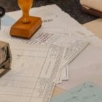 Thai Food and Drug Administration official documents and stamps on a desk