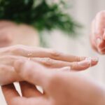 The exchange of wedding rings marks a moment of love and the first step toward thai citizenship mariage.