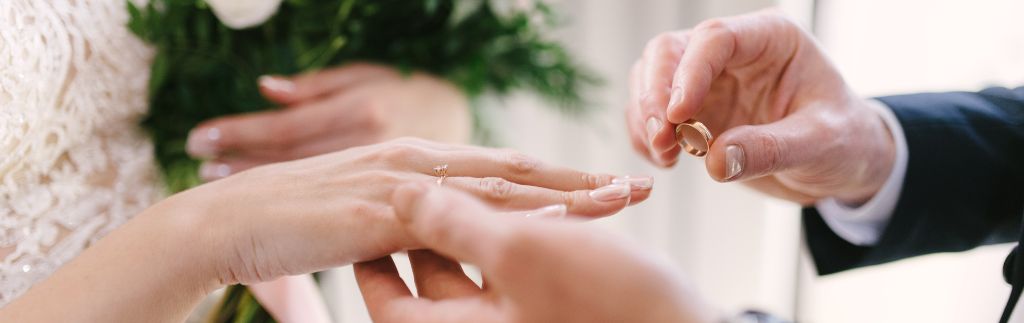 The exchange of wedding rings marks a moment of love and the first step toward thai citizenship mariage.