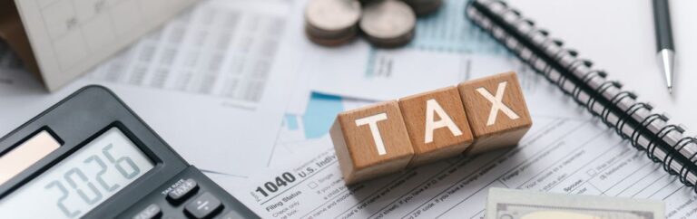 expat tax thailand concept with tax documents calculator and financial planning for expatriates