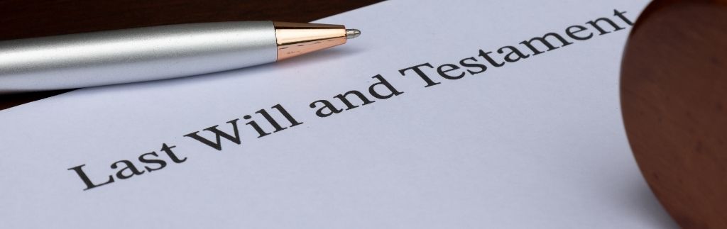 Dernière volonté et testament sur papier, documents cruciaux dans le cadre de la planification successorale internationale.