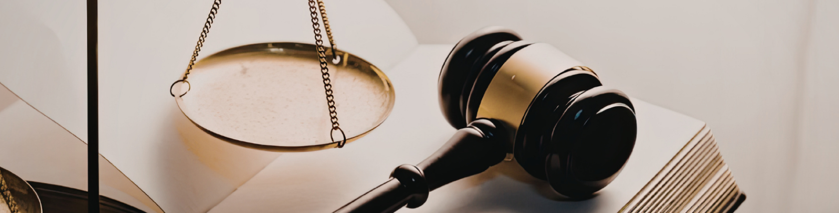Judge’s gavel and scales of justice representing dispute resolution and legal proceedings